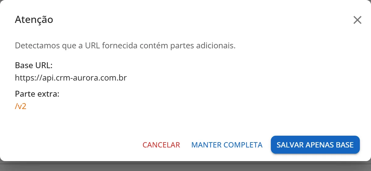 Janela Atenção mostrando a Base URL https://api.crm-aurora.com.br, a parte extra /v2 e os botões Cancelar, Manter completa e Salvar apenas base
