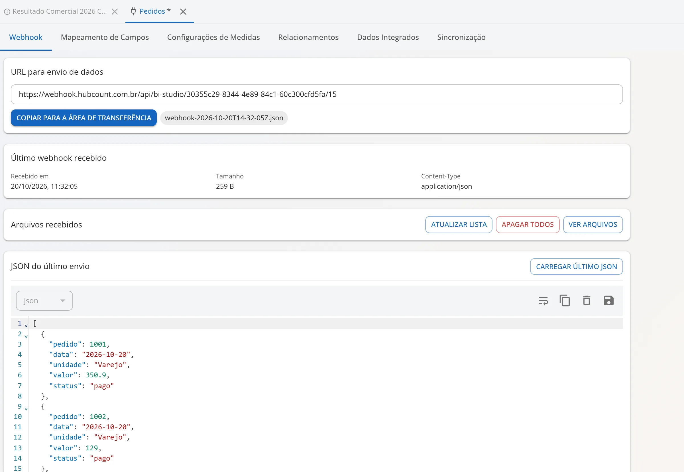 Aba Webhook do cubo Pedidos com a URL para envio de dados, o quadro Último webhook recebido com data, tamanho e Content-Type, a lista de arquivos recebidos e o JSON do último envio carregado