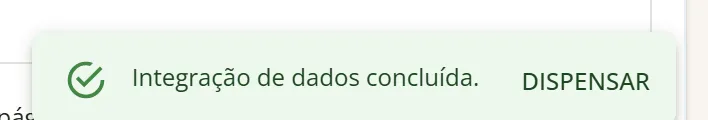 Aviso verde no canto da tela com o texto Integração de dados concluída. e o botão Dispensar